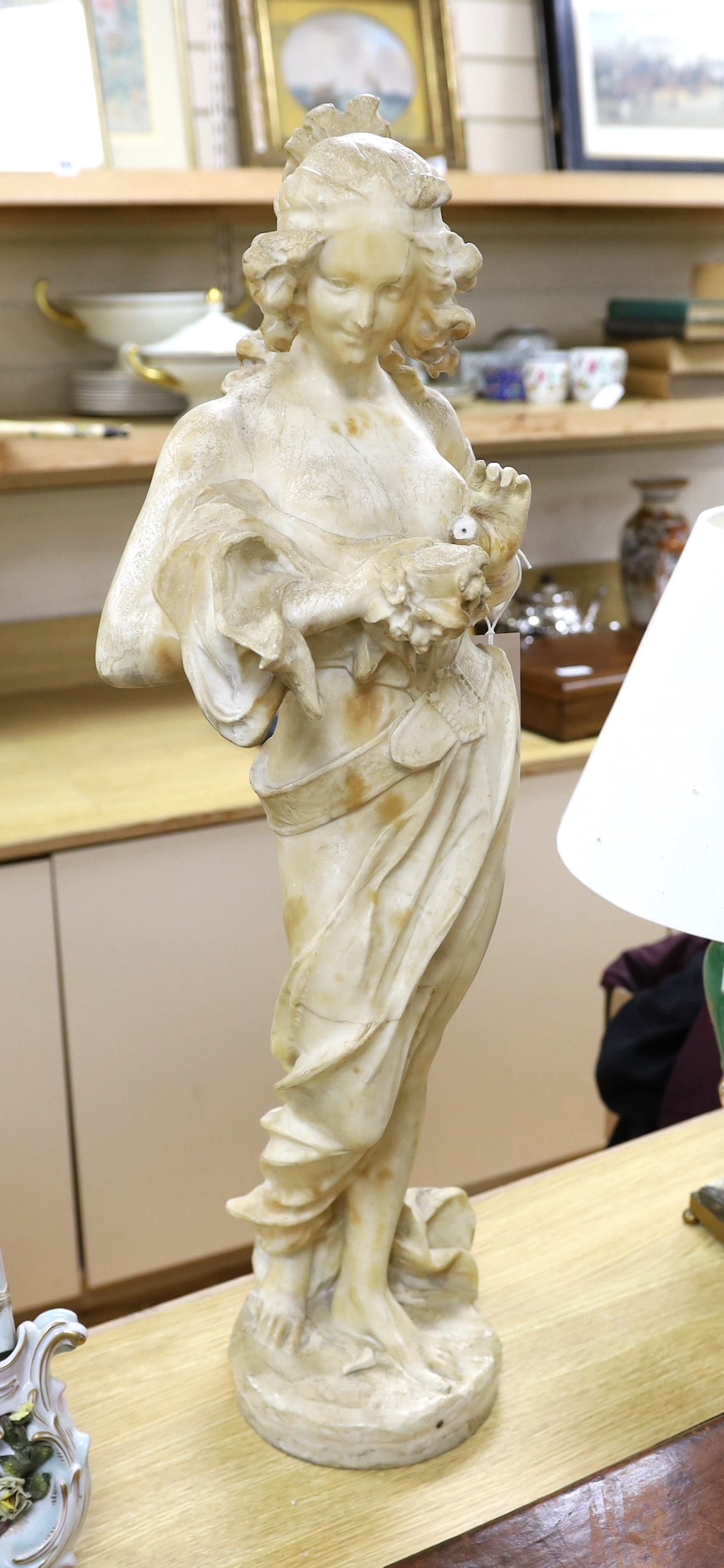 A 19th century white marble female figure (a.f.), 81cm